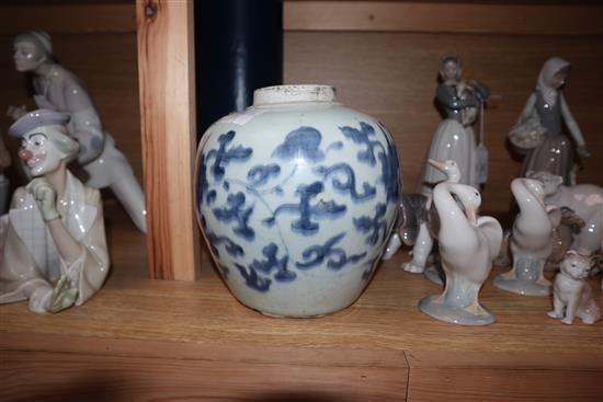 A 17th century Chinese blue and white ovoid jar, unglazed base height 17.5cm, lacking cover